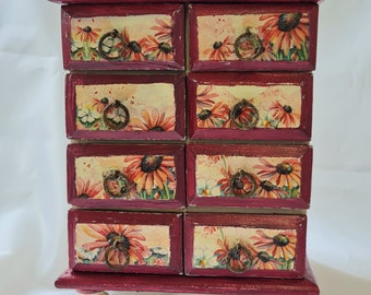 Vintage table top drawer unit, painted and decoupaged with a gerbera design.