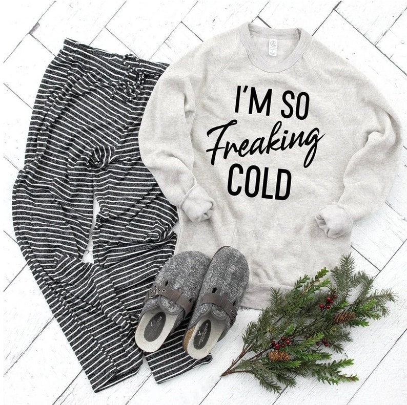 styled outfit with tee saying Im so cold