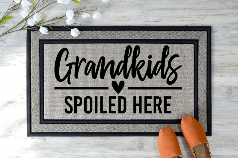 rectangular Polyethylene Fabric doormat with Non-Slip Rubber Backing print the phrase "Grandkids Spoiled Here"