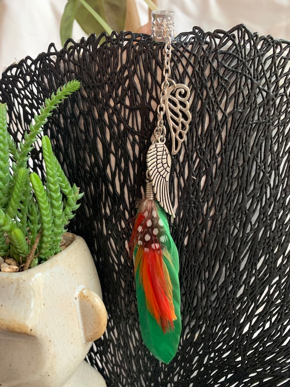 Dread beads with partridge feathers