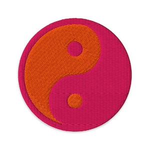 May include: Embroidered patch with a yin and yang symbol. The design features a bright orange yin shape set against a fuchsia pink yang shape. The patch is circular and has a textured appearance. The diameter is approximately 7 cm.