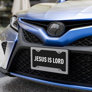 Jesus Is Lord Vanity License Plate – Bold Black & White Christian Car Tag Message