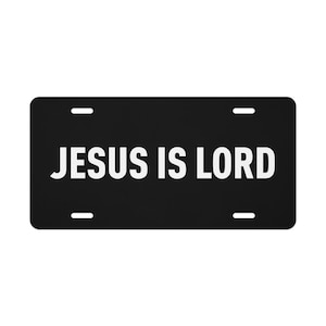 Faith-forward and unmistakably bold—this black vanity plate features a minimal white-letter “Jesus Is Lord” message in a clean, condensed font. Durable aluminum construction with universal sizing fits most vehicles; lightweight yet built to last. Perfect for making a quiet but confident statement of belief wherever you drive.