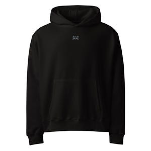 May include: Black hoodie with a front pocket and a small, light blue Union Jack emblem on the chest. The sweatshirt features a drawstring hood and long sleeves. A casual, comfortable garment.