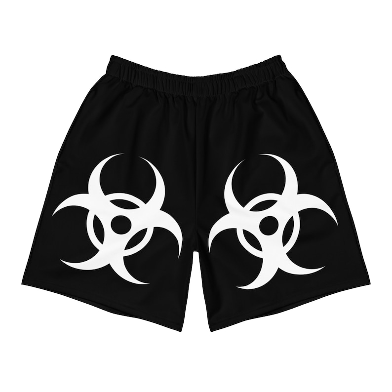 Toxic energy. These white and black biohazard athletic shorts are made from recycled performance fabric and built with a bold graphic edge—perfect for workouts, raves, or street-level chaos. Lightweight, breathable, and ready for movement with a punch of Y2K-era attitude. ☣️🏁♻️