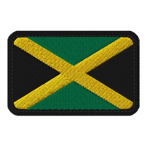 May include: Embroidered patch featuring the Jamaican flag. The design includes a black background, a green center, and a yellow diagonal cross. The patch has a black border and a textured appearance.