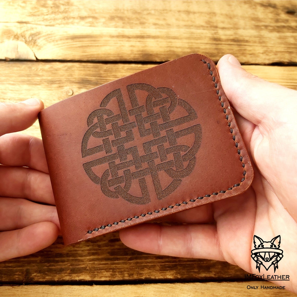 Handmade leather bifold wallet with laser engraving of the Etsy