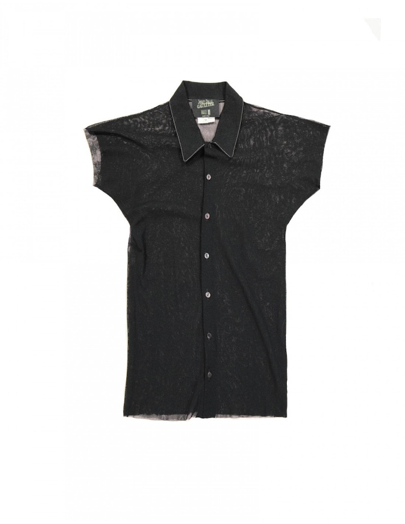 May include: A black sheer button-up shirt with short sleeves. The shirt has a delicate, almost see-through texture.