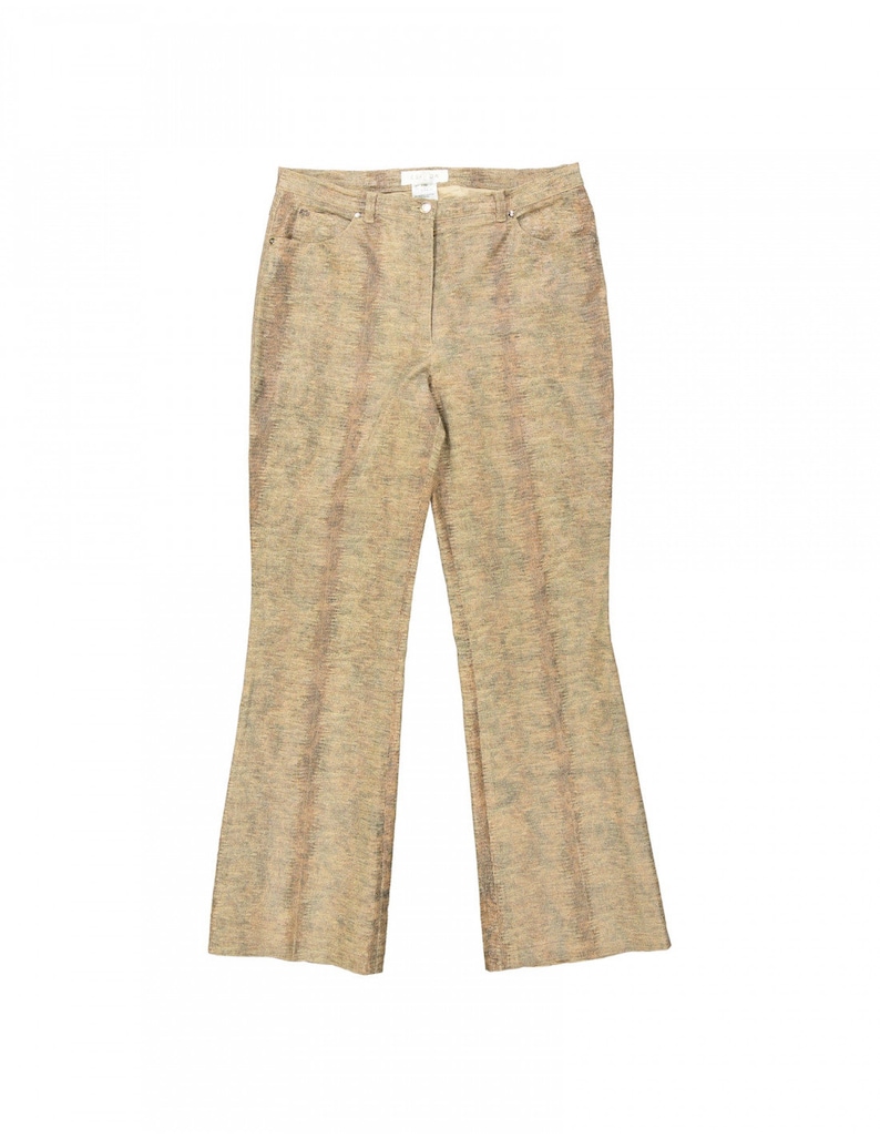 May include: Tan-colored, textured pants with a flared leg. The pants have a high waist, belt loops, and pockets. The fabric has a subtle pattern with vertical lines in shades of tan, brown, and green. The pants are designed for a comfortable fit.