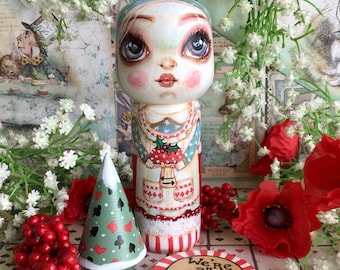We're All Merry Here Christmas Alice in Wonderland art doll set. Hand painted Alice with Christmas tree and base. Festive gift set