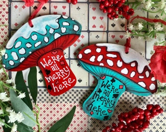 We're All Merry Here hand painted Christmas Mushroom decoration. Alice in Wonderland Toadstool. Festive decor tree ornament or gift