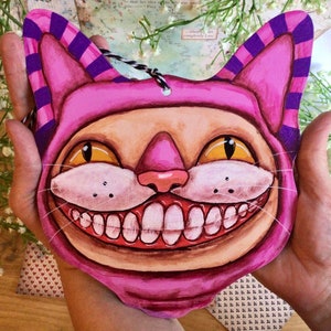 Giant grinning hand painted Cheshire Cat decoration from Alice in Wonderland Through the Looking Glass. Wooden hanging cat tree ornament.