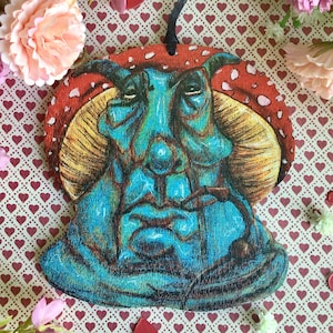 Absolem Alice in Wonderland blue caterpillar laser cut hanging decoration. Wonderfully weird Halloween Christmas mushroom ornament