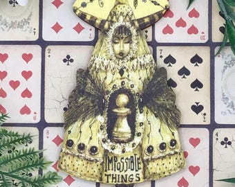 White Queen Alice in Wonderland fantasy hanging decoration. Wonderfully weird vintage style Christmas tree ornament decor.