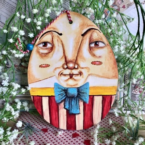 Giant Humpty Dumpty in a pie box from Alice in Wonderland. Easter or Christmas hand painted wooden hanging tree topper decoration ornament