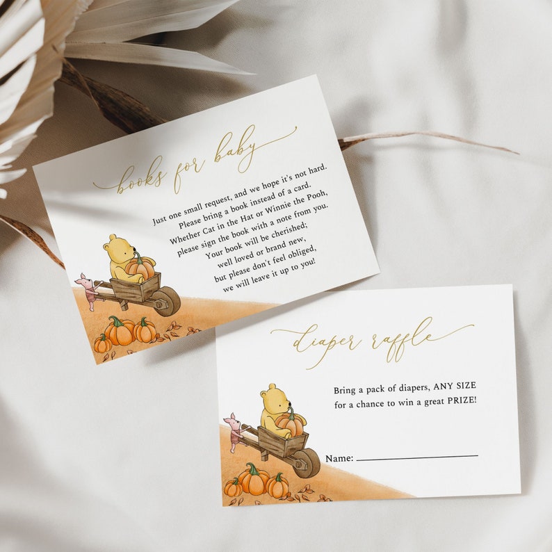 May include: Two baby shower cards with Winnie the Pooh illustrations. One card reads "Books for Baby" and requests a book instead of a card. The other card says "Diaper Raffle" with a space for a name.