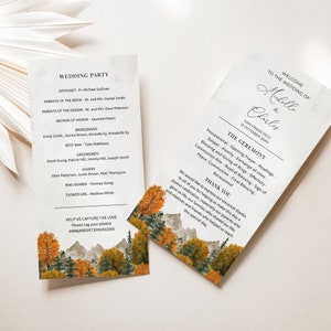 May include: Wedding ceremony program with a fall forest scene. The program includes the names of the wedding party, the officiant, and the ceremony order. The text "Mabelle & Charles" is at the top of the program.
