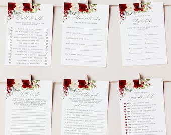 May include: Bridal shower game cards with floral decorations. The cards include games such as "Would She Rather" and "He Said, She Said." The text is printed on white cards with a floral design of red and white flowers.