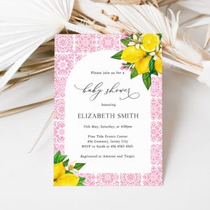 May include: A pink and white baby shower invitation with a lemon illustration. The invitation reads "Please join us for a baby shower honoring Elizabeth Smith. 15th May, Saturday, at 4:00pm. Pine Tide Events Center, 456 Greenery, Jersey City. RSVP to Sarah at 456 4565 4565. Registered at Amazon and Target."