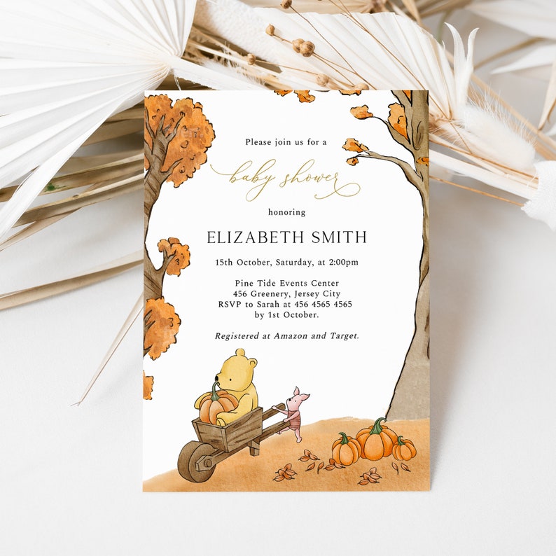 May include: Baby shower invitation featuring a watercolor illustration of Winnie the Pooh and Piglet with pumpkins. The invitation includes details for Elizabeth Smith's baby shower, with fall-themed trees and foliage.