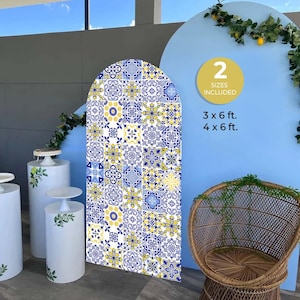May include: A blue and yellow patterned arch backdrop with a white background. The backdrop is made of tile-like squares. The backdrop is 3 feet by 6 feet or 4 feet by 6 feet. The text "2 Sizes Included" is on a yellow circle. The text "3 x 6 ft. 4 x 6 ft." is below the circle.