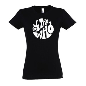May include: Black t-shirt with a white circular logo featuring the band name "The Who" and a guitar graphic. The top has short sleeves and a crew neck.