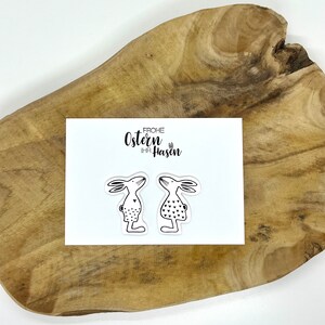 Postkarte "Frohe Ostern ihr Hasen" mit Hasen in 3D-Optik, gestempelt