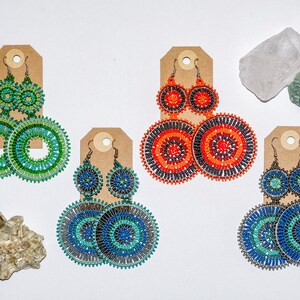 Vibrant, Boho Style African Double Hoop Earrings on Gift Tags with Crystals on the corners.