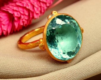 パライバトルマリンリング：0.33カラットの宝石、18Kゴールドの