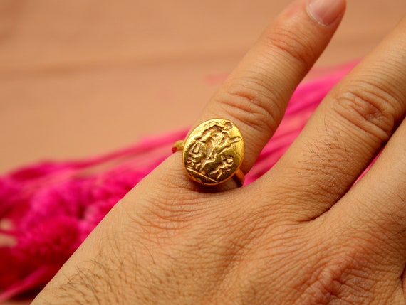 Anillo moneda oro sale