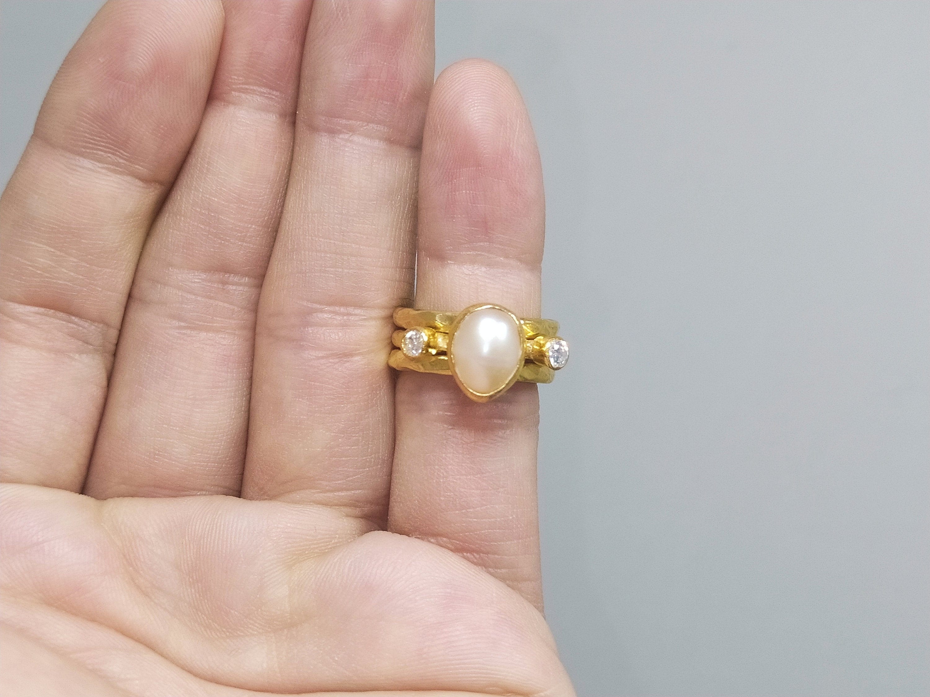 This Pearl embedded yellow gold ring... - Dinidu Jewellery | Facebook