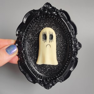 Glow in Dark Ghost Wall Art: Black Metal Framed Sculpture