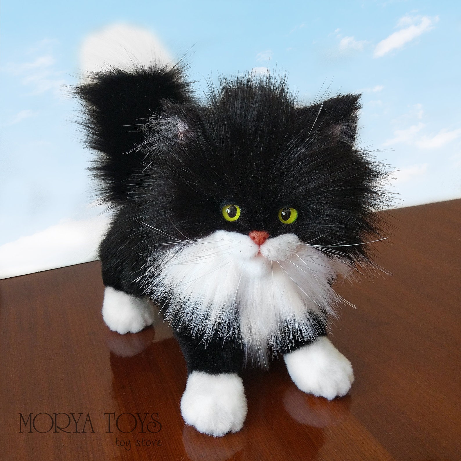 black and white stuffed cat toy