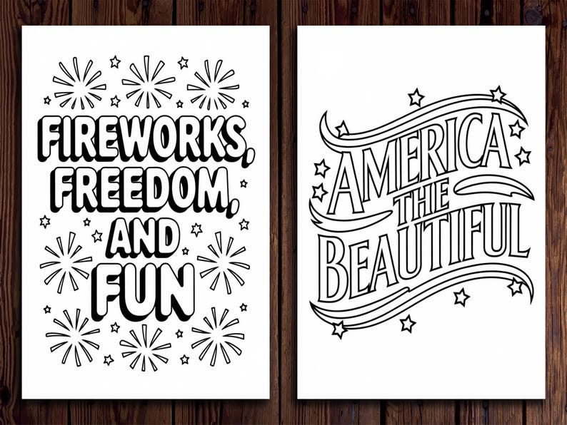 May include: Two black and white prints with patriotic themes. One print reads "Fireworks, Freedom, and Fun" with star and firework illustrations. The other print says "America the Beautiful" with star and wave illustrations.