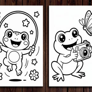 May include: Two black and white illustrations of cartoon frogs. One frog is jumping rope with stars and flowers around it. The other frog is holding a camera with a butterfly nearby. The images are on a wooden background.