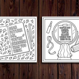 May include: Two black and white inspirational art prints. One shows a journal with the text "DEAR FUTURE ME, YOU'RE STRONGER THAN YOU THINK." The other depicts a mirror with the text "YOU'RE NOT BEHIND, YOU'RE EXACTLY WHERE YOU NEED TO BE."