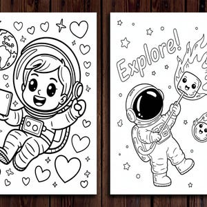May include: Two black and white coloring pages featuring astronauts. One astronaut is holding a phone near Earth and surrounded by hearts and stars. The other astronaut is roasting a marshmallow with the word "Explore!" above.