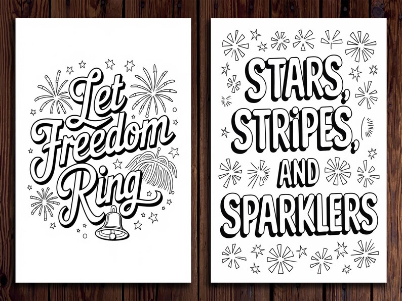 May include: Two black and white prints with patriotic themes. One print says "Let Freedom Ring" with fireworks and a bell. The other print says "Stars, Stripes, and Sparklers" with star and firework illustrations.