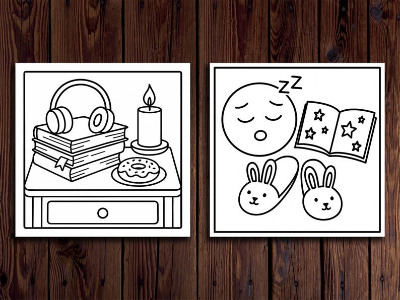 May include: Two black and white illustrations on a wooden background. One shows headphones, books, a candle, and a donut. The other depicts a sleeping emoji, a book with stars, and bunny slippers. The illustrations are framed.