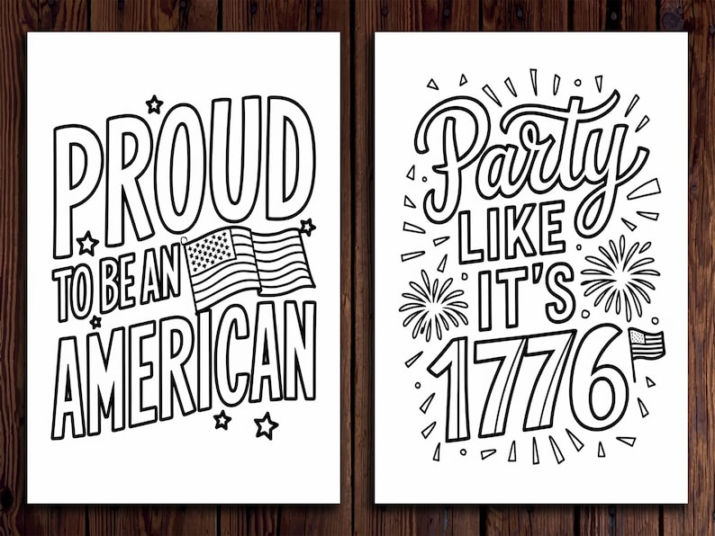 May include: Two black and white prints on white backgrounds. The left print reads "PROUD TO BE AN AMERICAN" with an American flag graphic. The right print says "Party LIKE IT'S 1776" with fireworks and an American flag graphic. Both are on a wood background.