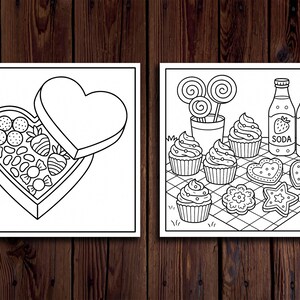 以下が含まれることがあります： 木製の背景に2つの白黒イラスト。1つはハート型のチョコレートの箱を示しています。もう1つは、カップケーキ、クッキー、ロリポップ、ソーダボトルがチェック柄のピクニックブランケットに配置されています。