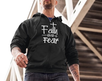 Sudadera con capucha cristiana unisex con cremallera "Fe sobre el miedo"