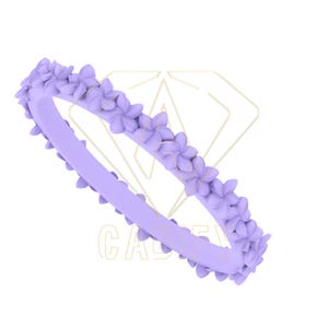 May include: A lavender-colored ring with a floral design. The ring is made of silicone and features a series of small, raised flowers.