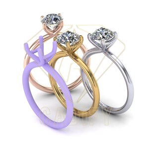 May include: Three engagement rings with different metal settings. The rings are stacked on top of each other. The top ring is silver, the middle ring is gold, and the bottom ring is rose gold.