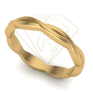May include: A gold-coloured, twisted, infinity-style wedding band.