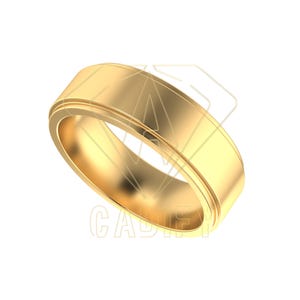 Puede incluir: Un anillo dorado con una banda plana y un borde acanalado. El anillo tiene un acabado pulido y un diseño simple y elegante. El anillo probablemente está hecho de oro o un metal dorado.