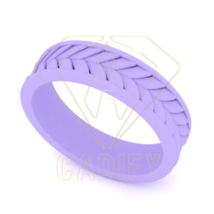 Puede incluir: Un anillo de silicona lavanda con un diseño trenzado.