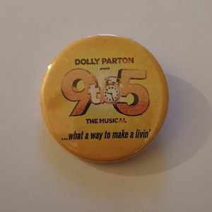 A 38mm 9 to 5 badge