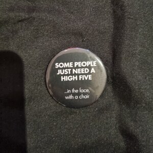 A 38mm Some People Just Need A High Five In The Face With A Chair badge