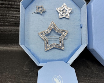 Nuevo juego de 3 pinzas para el cabello Swarovski vintage con forma de estrella, nuevas en caja.